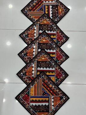 Embroidered cushion covers in Black, Orange, Red